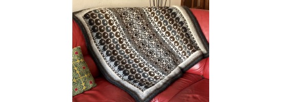 Plaid et coussins TRICOT